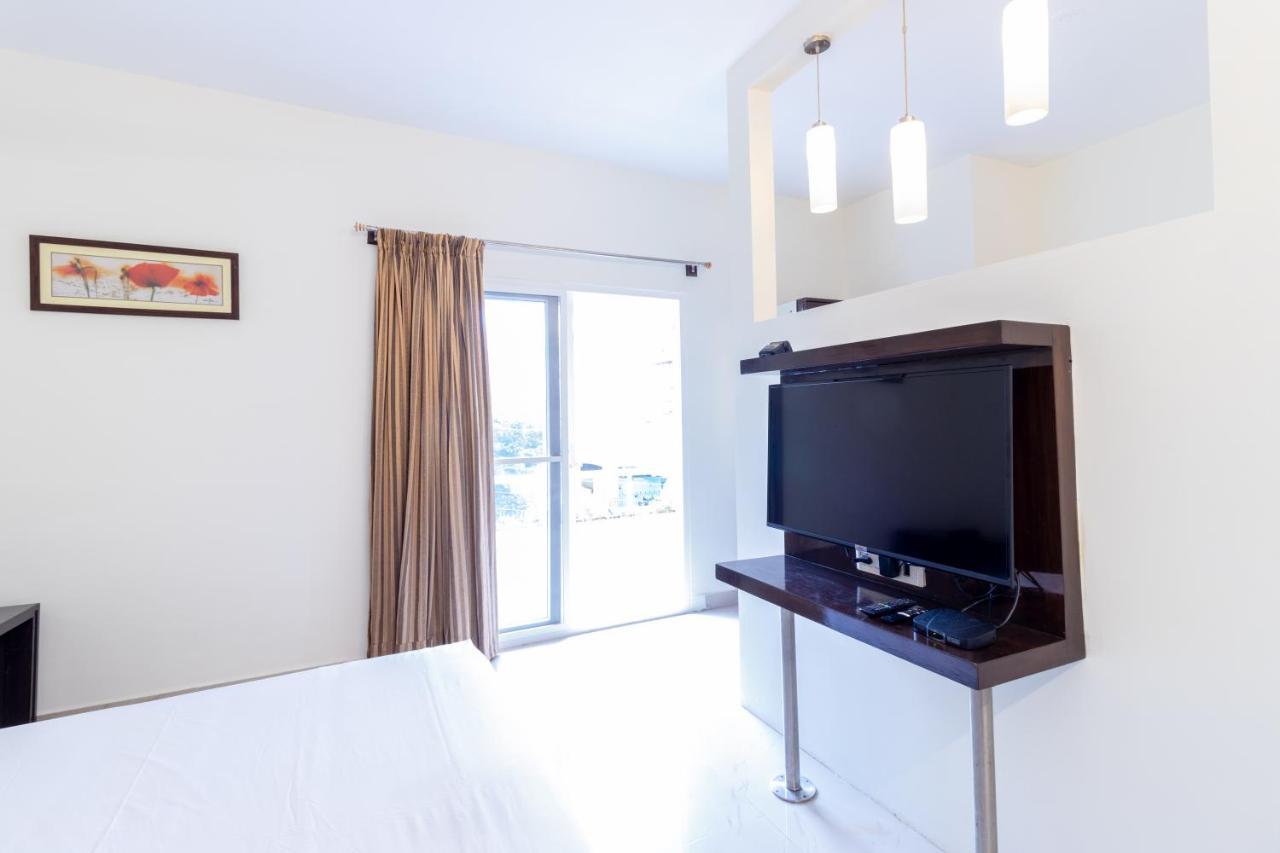 Sanctum Suites Domlur Μπανγκαλόρ Δωμάτιο φωτογραφία