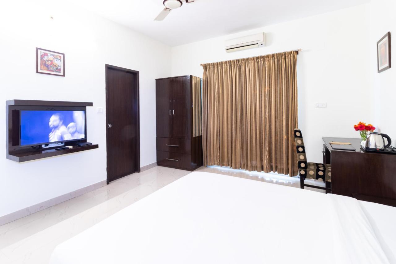 Sanctum Suites Domlur Μπανγκαλόρ Δωμάτιο φωτογραφία