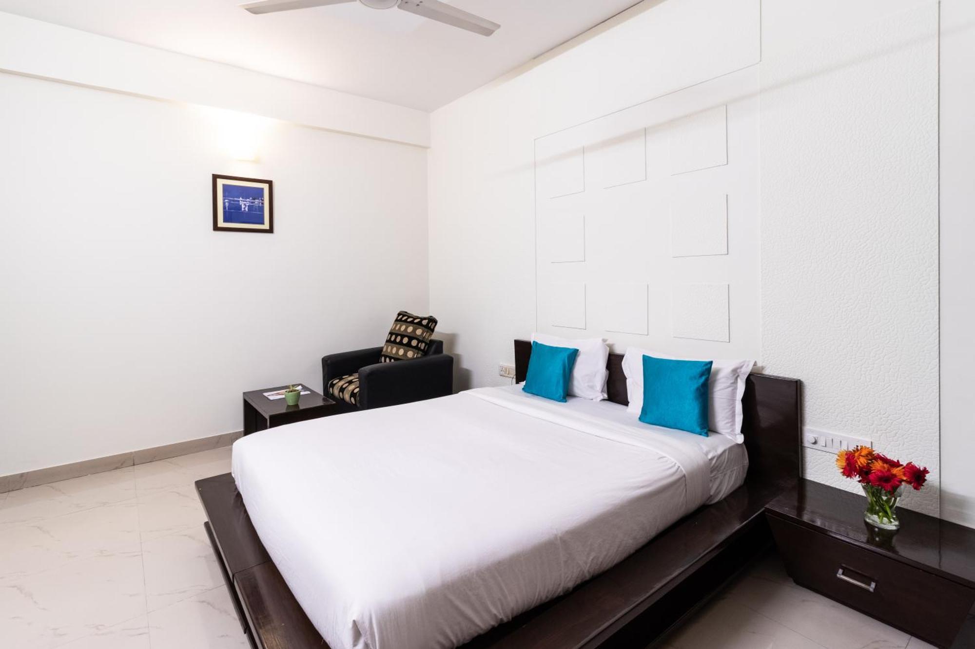 Sanctum Suites Domlur Μπανγκαλόρ Δωμάτιο φωτογραφία